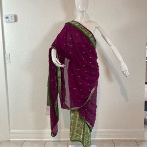 Indian saree featuring a decorative greenElegant Purple and Green Women's Scarf